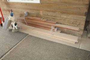 lot 355 image: Lot of (Approximately 19) Misc. Wood - 8 Wood Board 1x4 (Approximately x15), 8 Siding 7 (x4)