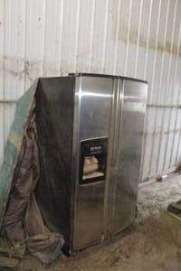 lot 9 image: 2000 KitchenAid Stainless Steel Side-By-Side Refrigerator Freezer with Front Door WaterIce KSRS27IH5500