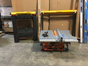 lot 1 image: Ridgid 10 in Table saw and saw horses used see pictures