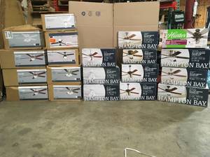 lot 11 image: Assorted Pallet with Hampton Bay Ceiling Fans various models see pictures
