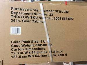 lot 13 image: Husky Garage Cabinet 36 x 72 x 24 adjustable shelf steel Storage not used