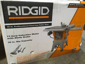 lot 28 image: Ridgid 13 Amp 10 in. Professional Cast Iron Table Saw open box
