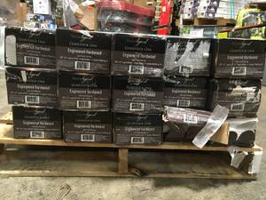 lot 30 image: Pallet with 15 cases Home Legend Gunstock Oak 38 in. Thick x 5 in. Wide x Varying Length Click Lock not used