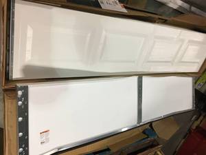 Classic Collection Series 8 ft. x 7 ft. 6.3 R-Value Insulated White Garage Door by Clopay not used whit some damage please review the pictures