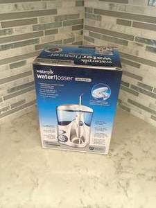 lot 100 image: Waterpik Water Flosser