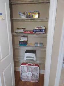 lot 104 image: Misc Contents of Closet