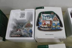 lot 53 image: Department 56 Maker Bros. Bagel Bakery from The Heritage Village Collection Christmas In The City Series #56.58920