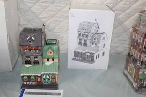 lot 13 image: Department 56 The Chocolate Shoppe from The Heritage Village Collection Christmas In The City Series #5968-4