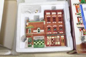 lot 41 image: Department 56 Variety Store & Barbershop from The Heritage Village Collection Christmas In The City Series #5972-2