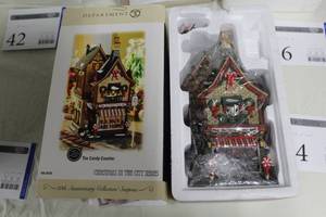 lot 44 image: Department 56 The Candy Counter from The Heritage Village Collection Christmas In The City Series #56.59256