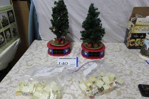 lot 140 image: Lot of (2) Christmas Tree Displays with Stands and Drawers