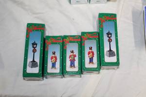 lot 204 image: Lot of (5) Russ Christmas Dcor An Old Fashioned Christmas Porcelain Collection - Band Boy With Saxophone (x2), Band Boy With Drum