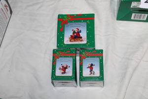 lot 203 image: Lot of (3) Russ Christmas Dcor An Old Fashioned Christmas Porcelain Collection - Boy On Sleigh, Girl Skater, Boy Skater