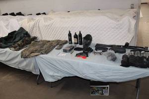 lot 231 image: Tippman A-5 Paintball Gun, Camo Clothing, Paintball Helmet, Air Bottles, Accessories, Battle Gear