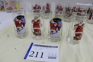 lot 211 image: Lot of (4) Coca-Cola The Famous Haddon Sundblom Santa Claus 1943 Christmas Glasses