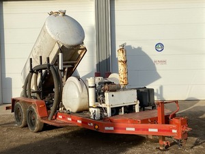 lot 3 image: 2012 Ditch Witch Vaccum Trailer