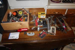 lot 185 image: Crescent Wrenches, Squares, Hammer, Scraper Blades, Tape Measure, Files, Scrapers, Wrenches, Stapler, Saws, Misc. Hand Tools