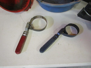 lot 44 image: Oil Funnels, Oil Pans, Grease Gun, Shop Stool