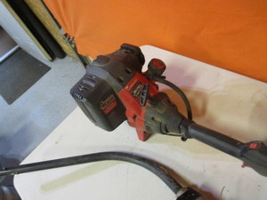 lot 49 image: Troy-Bilt Trimmer EZ-Link wAttachments