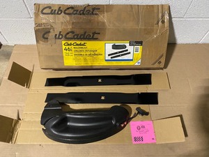 lot 56 image: CUB CADET ORIGINAL EQUIPMENT 46 IN. MULCHING KIT WITH BLADES FOR LAWN TRACTORS AND ZERO TURN MOWERS (2010 AND AFTER) NOT USED SEE PICS