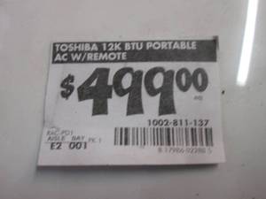 lot 49 image: Toshiba 12K BTU Portable AC No remo...