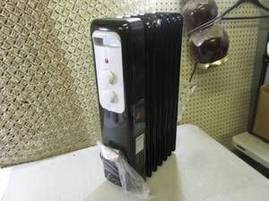 lot 77 image: Oil Filled Radiant Electric Heater ...