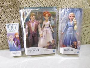 lot 99 image: Disney Frozen II Figures and Puzzle...