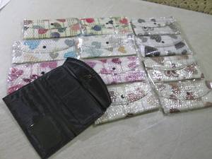 lot 104 image: Lot of 12 Ladies Wallets with Heart...