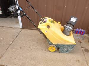 Yard man 5.5 hp 4 cycle snow thrower. Fires on ether. Choke is stuck closed. Needs gas cap. As shown.