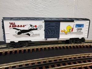 lot 77 image: Lionel Warner Brothers. Sylvester and Twenty ALL A BIR R D Box Car