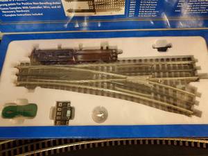 lot 135 image: Atlas Train Track Right Hand Remote Item# 6073 New