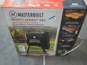 lot 217 image: Masterbuilt Gravity Series 560 Digital Charcoal Grill Plus Smoker in Black MB20040220