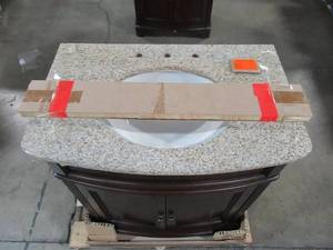 lot 219 image: Home Decorators Collection 31 in. W x 35 in. H x 20 in. D Vanity in Cherry with Marble Vanity Top with Basin MD-V1218