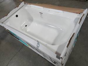 lot 111 image: Mauicast Plus 60 x 32 x 16 58 Left Drain Rectangular Alcove Soaking Bathtub in White Small Enamel Chip on Top Middle Threshold opposite Drain.