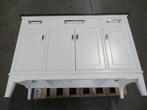 lot 116 image: Home Decorators Collection Manor Grove 49 in. W Bath Vanity in White with Granite Vanity Top in Black with White Basin 13213-VS49A-WT - CrackedChipped Top, Cabinet has some scratches and broken piece by front LH leg.