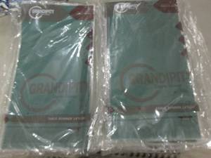 lot 117 image: 2- 12pks Green Plastic Table Runner...