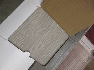 lot 217 image: 1 Cases Taupe Oak 6 in. x 36 in. P...