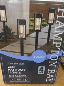 lot 60 image: Solar Black LED 15 Lumens Modern Bollard Path Light Set with Vintage Bulb (4-Pack)
