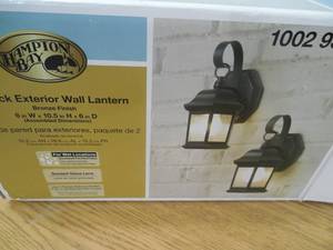lot 71 image: 1-Light Bronze Outdoor Wall Lantern Sconce with Seeded Glass (2-Pack)