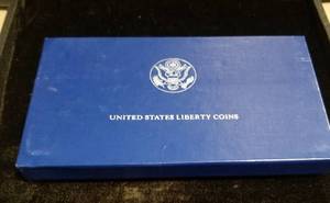1986 US ELLIS ISLAND COMMEMORATIVE SILVER DOLLAR & CLAD HALF 2 COIN SET