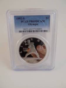 lot 10 image: 1992S Olympic $1 PR69DCAM Graded PCGS