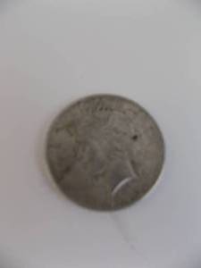 lot 15 image: 1922d Peace Silver Dollar