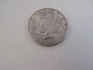 lot 24 image: 1922S Peace Silver Dollar