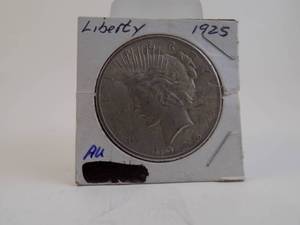 lot 48 image: 1925 Peace Silver Dollar