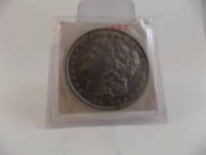 lot 53 image: 1885 Morgan Silver Dollar