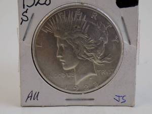 lot 65 image: 1928 S Peace Silver Dollar