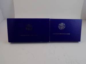 lot 91 image: 1986 US Proof Silver Dollar & Half Dollar 1886-1986 Liberty Silver Half Dollar Proof With Certificate of Authenticity In Box In Felt Box