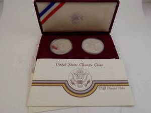 lot 96 image: 1983 & 1984 Proof Silver Dollars US Olympic 2 Proof Silver Dollars