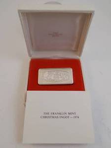 lot 99 image: 1974 Christmas Ingot 1000 Grains Solid Sterling Silver Bar Franklin Center PA With Certificate of Authenticity