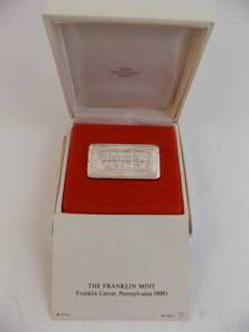 lot 134 image: 1975 Christmas Ingot Franklin Mint Solid Sterling Silver 1000 Grains With Certificate of Authenticity